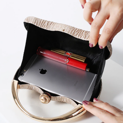 Elegant Handbag with Luxury Round Handle and Spacious Interior
