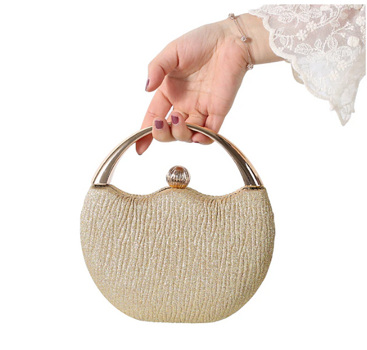 Elegant Handbag with Luxury Round Handle and Spacious Interior