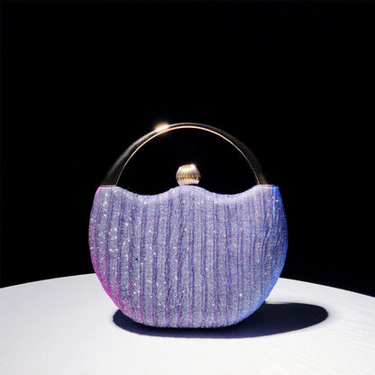 Elegant Handbag with Luxury Round Handle and Spacious Interior