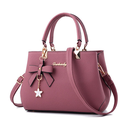 Women Shoulder Bag with Star Charm Bow Detail Soft Handle Modern Structured Handbag